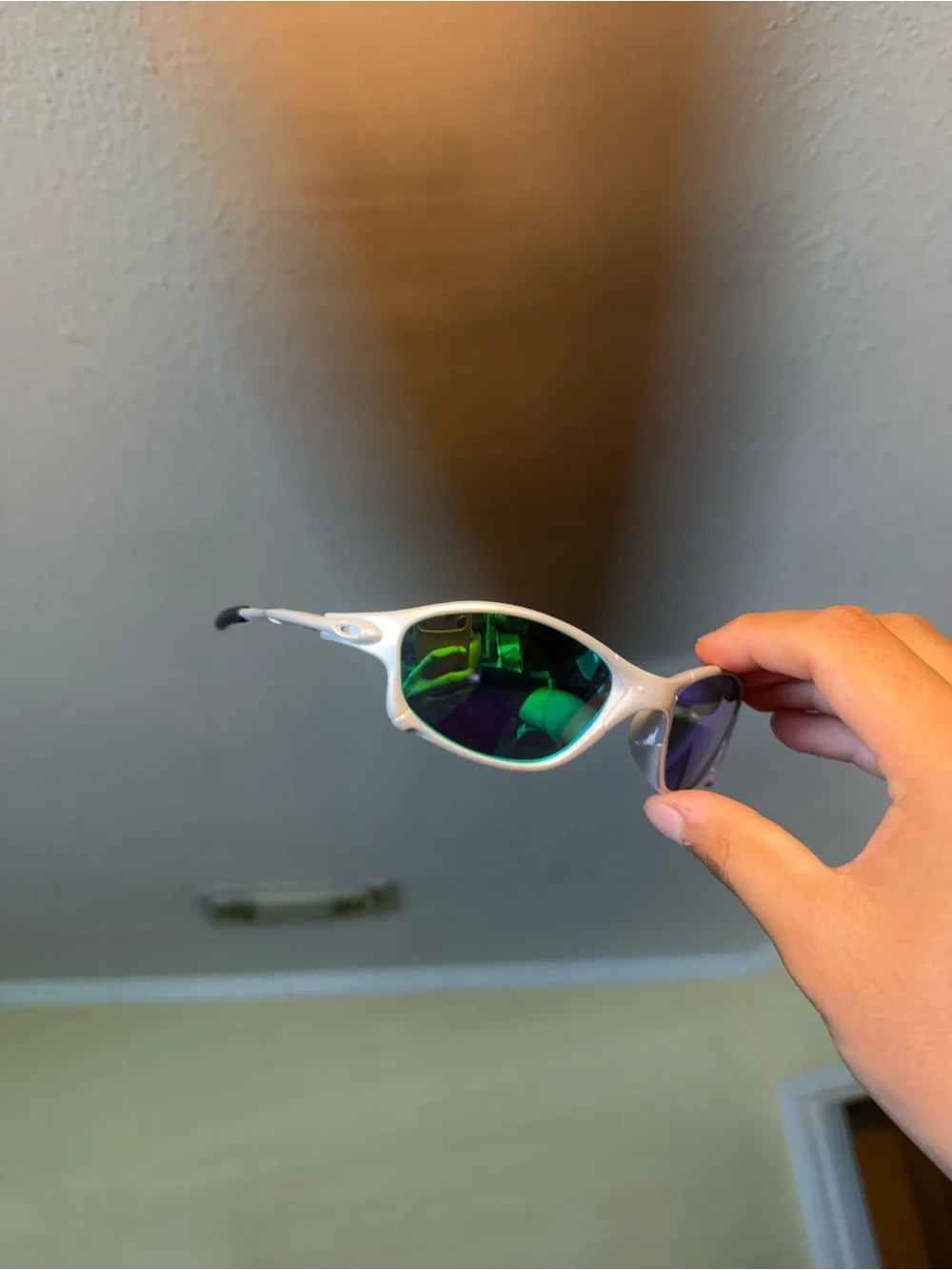 Sporty White Sunglasses with Oakleys  Green Mirrored Lenses